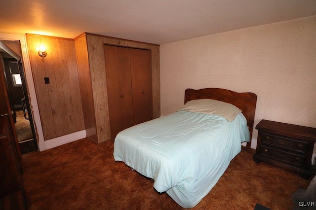 bedroom with carpet floors and a closet