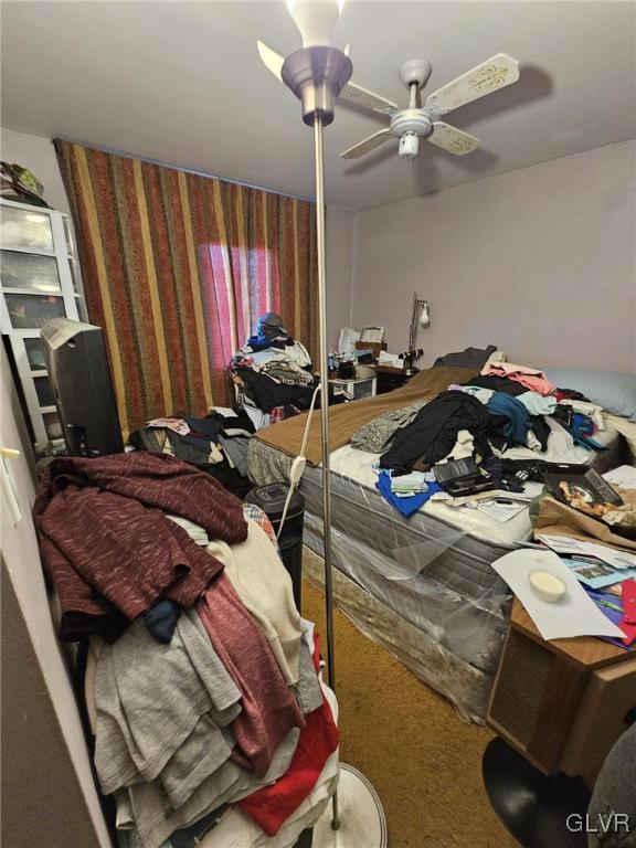 bedroom featuring carpet floors and ceiling fan