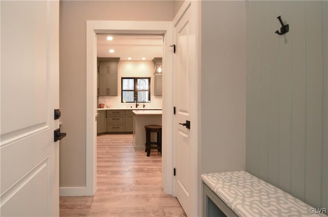 interior space with light wood-style floors and recessed lighting