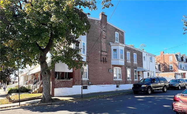 view of property with a residential view