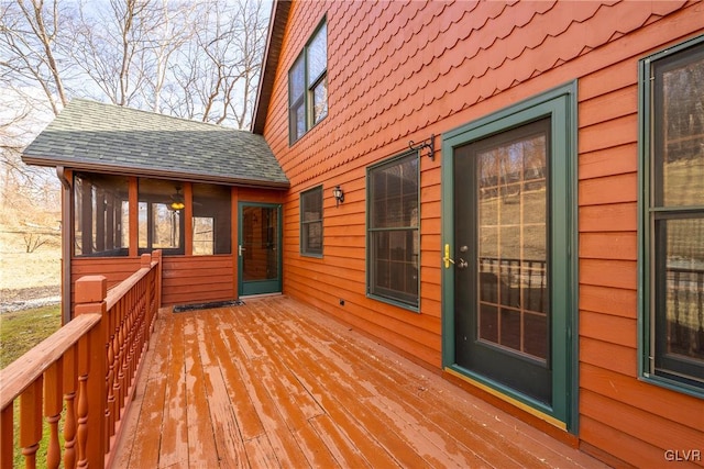 deck with a sunroom