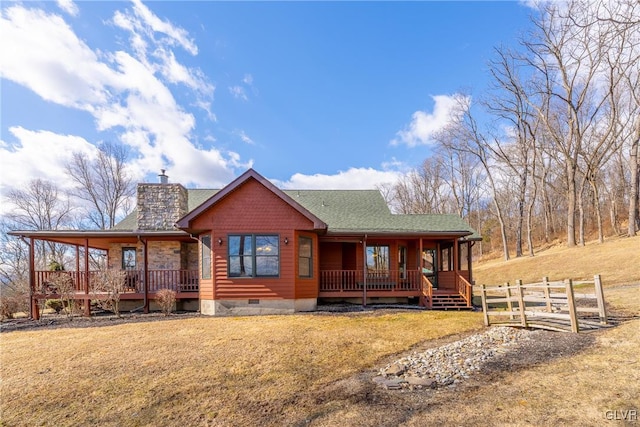 view of front of property with a porch, a shingled roof, fence, crawl space, and a chimney