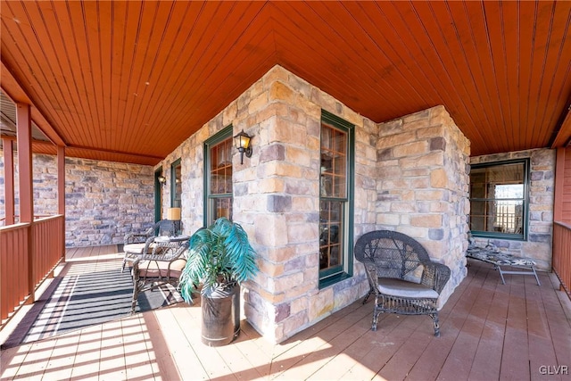 wooden deck with a porch