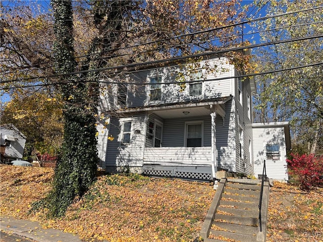 view of front facade featuring covered porch