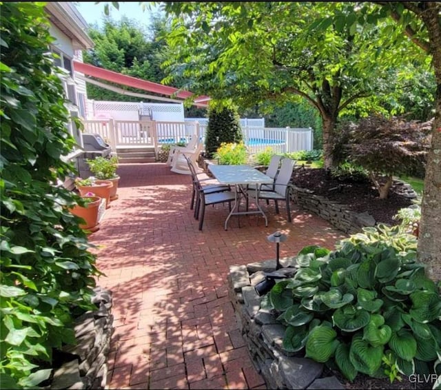 view of patio / terrace with fence