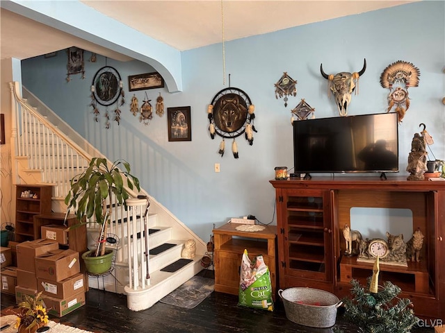 living room with stairs and hardwood / wood-style flooring