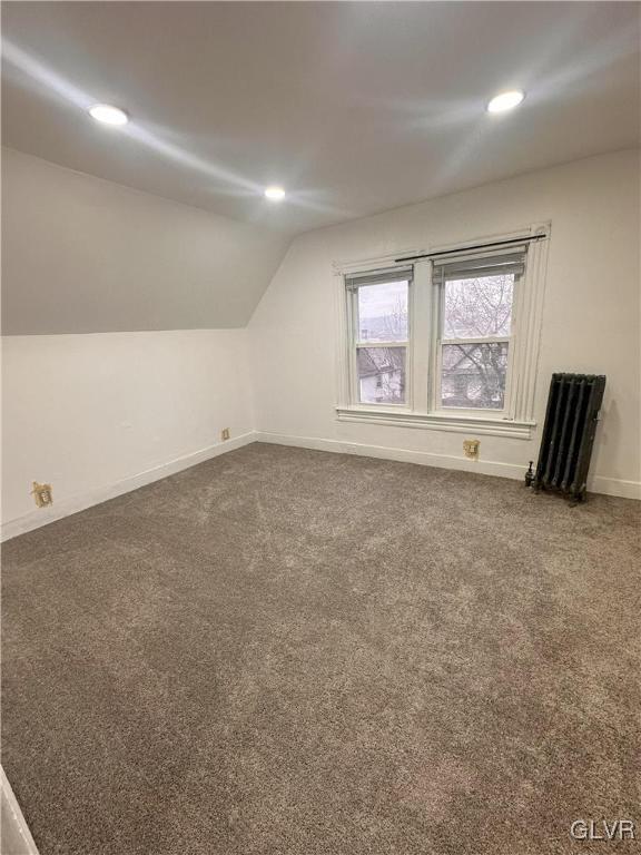 bonus room with carpet flooring, recessed lighting, baseboards, and lofted ceiling