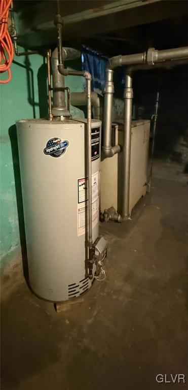 utility room with water heater