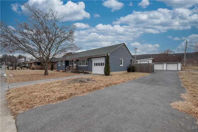 single story home featuring a garage