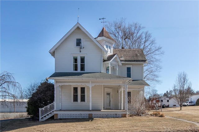 victorian-style house with a porch