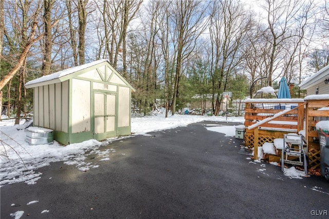 exterior space with an outdoor structure and a storage unit