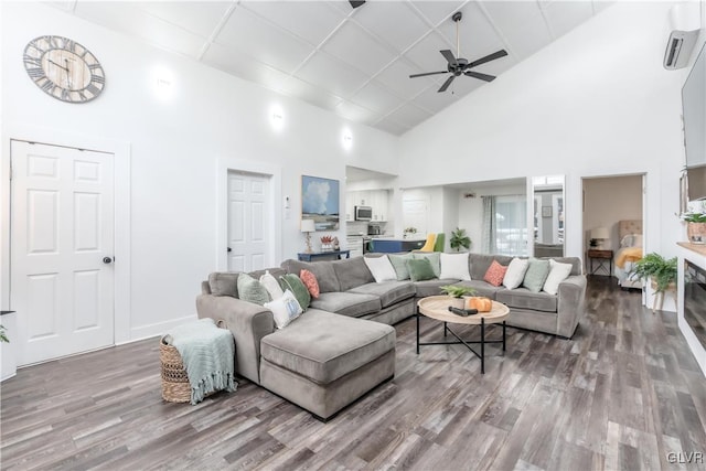 352 Scotch Pine Dr, Coolbaugh Twp, PA 18346 - living area featuring high vaulted ceiling, wood finished floors, ceiling fan, and baseboards
