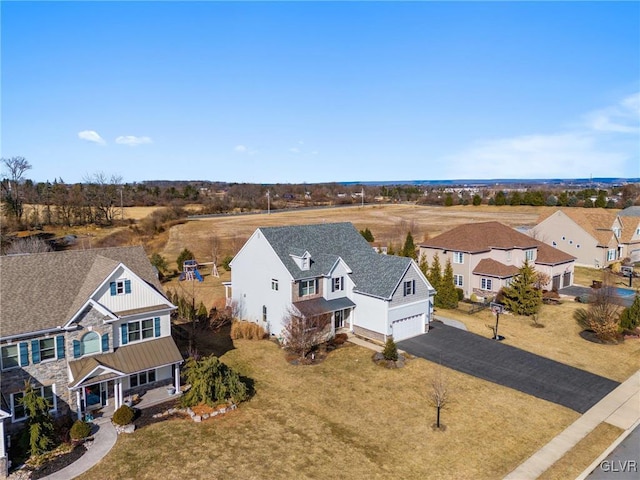 drone / aerial view featuring a residential view