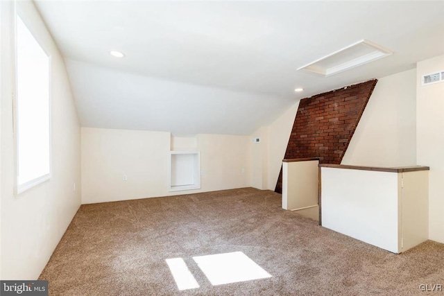 bonus room featuring carpet floors, lofted ceiling, visible vents, and recessed lighting