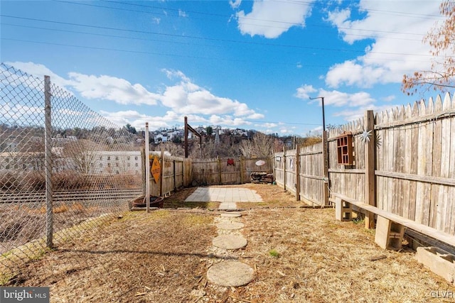 view of yard featuring a fenced backyard