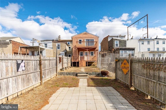 view of yard featuring a residential view and a fenced backyard