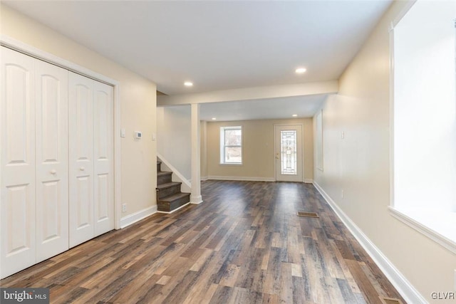 entryway featuring dark wood-style flooring, stairway, recessed lighting, and baseboards