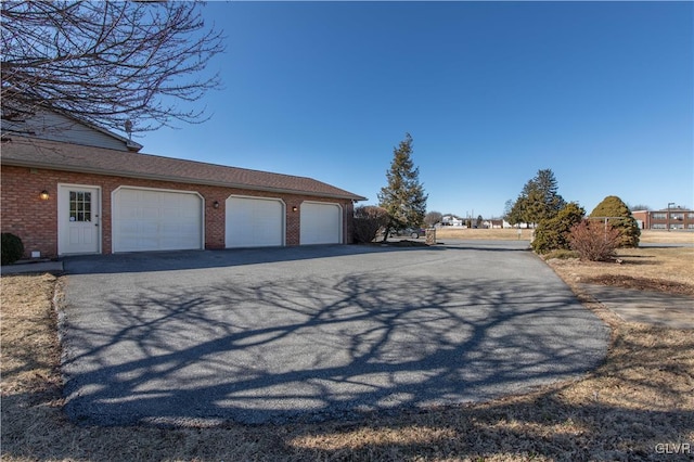 garage with driveway