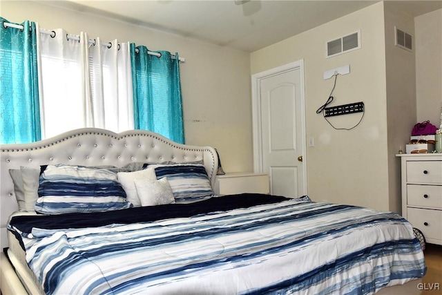 bedroom with visible vents