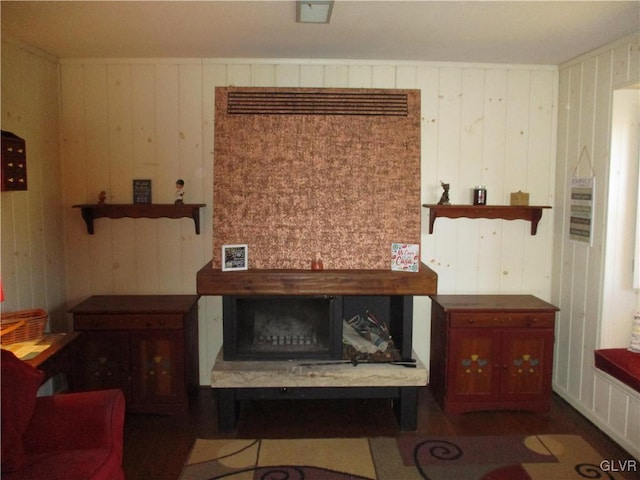 living room with a large fireplace