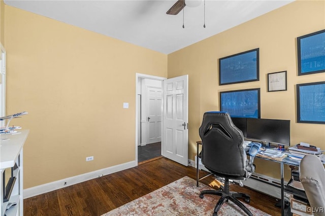 home office featuring ceiling fan, baseboards, and wood finished floors