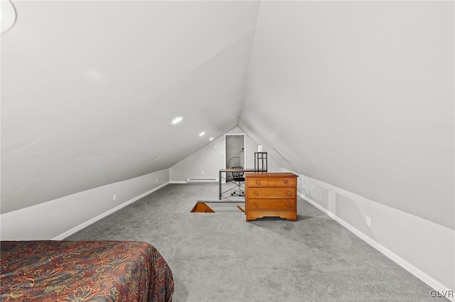 carpeted bedroom with lofted ceiling, baseboards, and a baseboard radiator