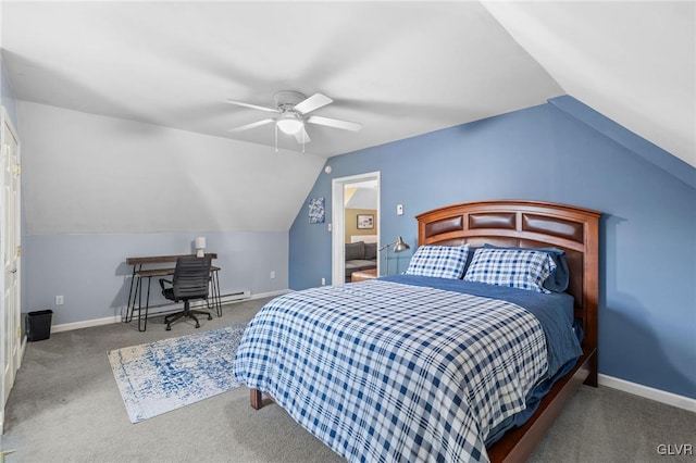 bedroom with lofted ceiling, carpet floors, and baseboards