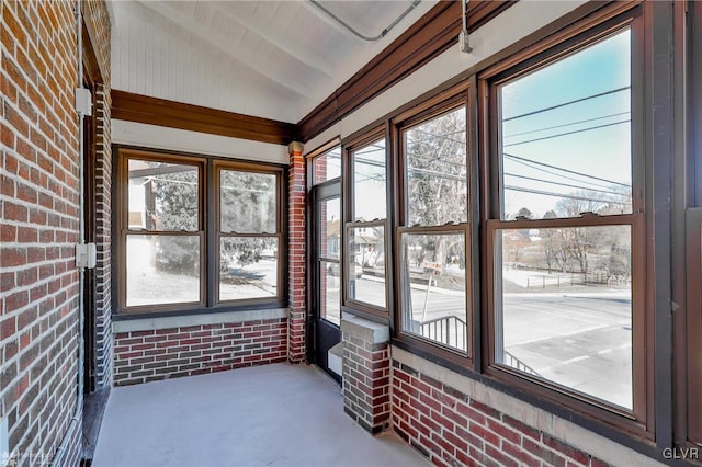 unfurnished sunroom featuring a wealth of natural light