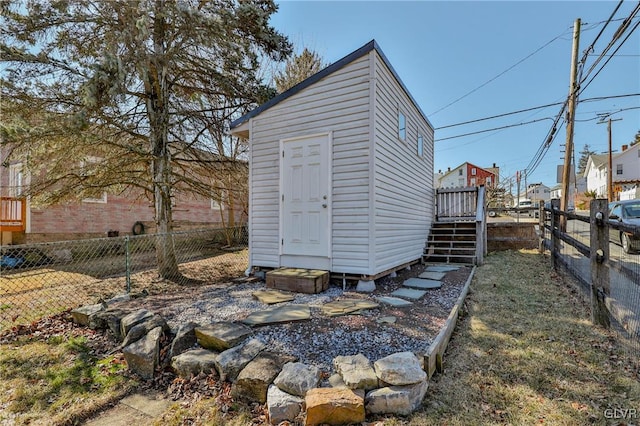 view of shed featuring a fenced backyard