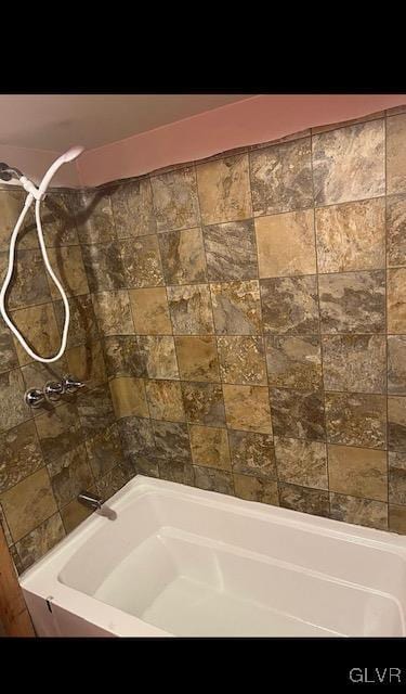 bathroom with shower / bath combination