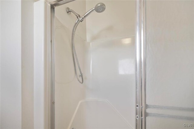 bathroom featuring a stall shower