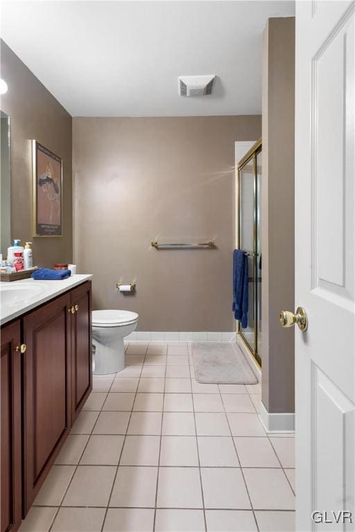 full bathroom featuring a shower stall, tile patterned flooring, visible vents, and vanity