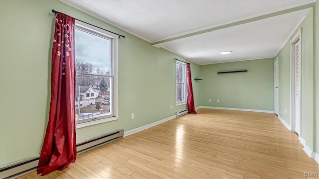 115 Aspen Cir E, Stroudsburg, PA 18302 - unfurnished room with baseboard heating, light wood-style flooring, and baseboards