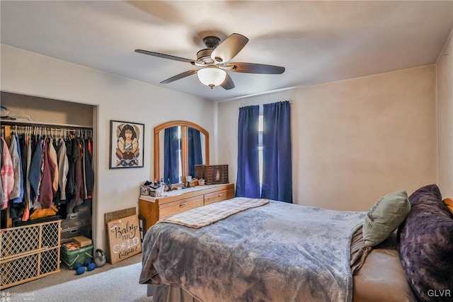 bedroom with carpet, a ceiling fan, and a closet