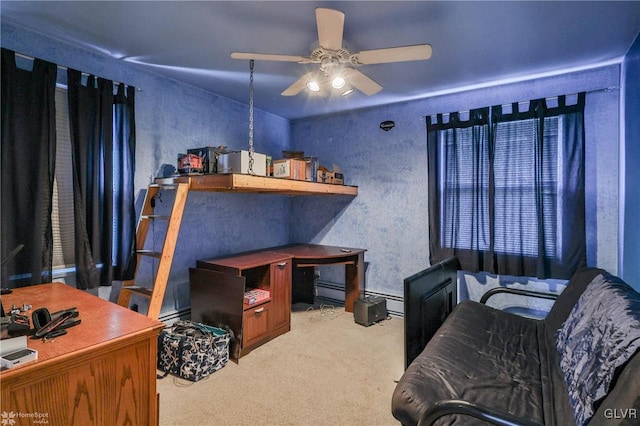 bedroom featuring a baseboard radiator, carpet flooring, and a ceiling fan