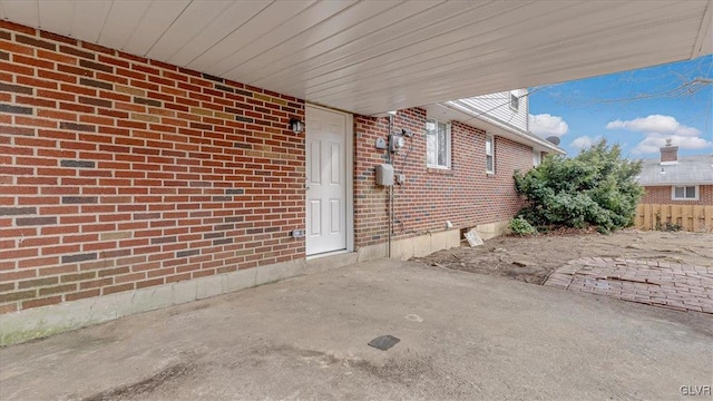 view of patio featuring fence