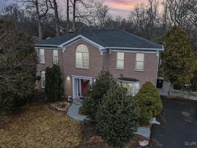 view of front of property featuring brick siding