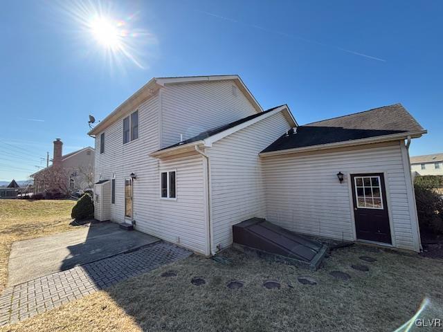 rear view of property with a patio