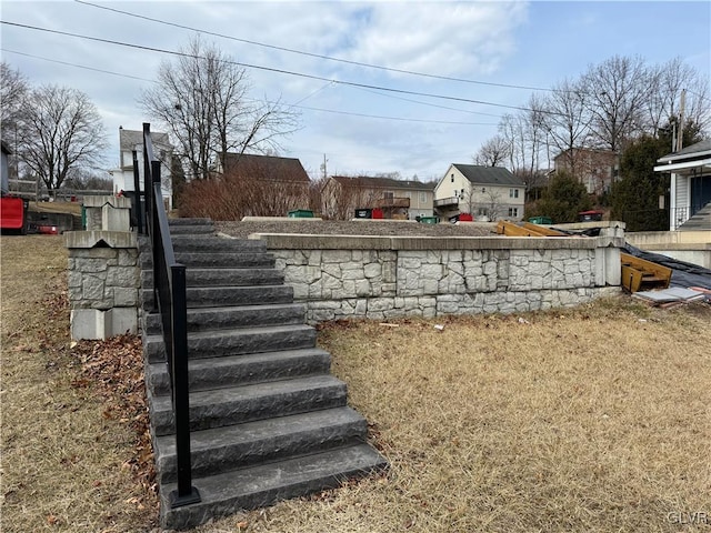 view of yard featuring stairway