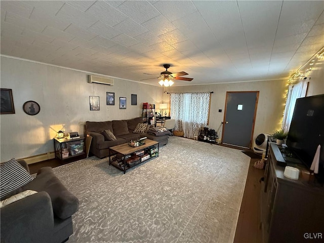 living area with ceiling fan and a wall mounted air conditioner