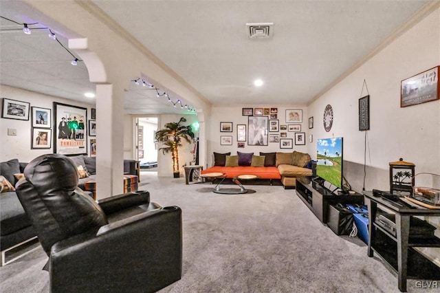 living area with carpet and visible vents