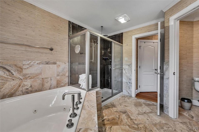 bathroom with a whirlpool tub, a shower stall, ornamental molding, and toilet