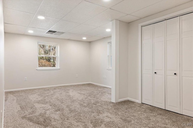 unfurnished bedroom with visible vents, baseboards, carpet floors, recessed lighting, and a closet