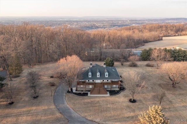 bird's eye view with a forest view