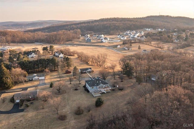 birds eye view of property featuring a rural view