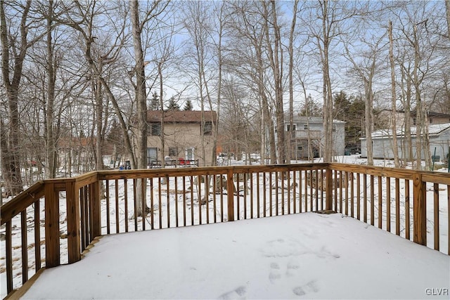 view of snow covered deck