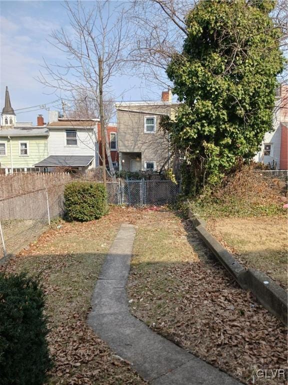 view of yard with fence