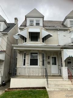 view of front of home featuring a porch