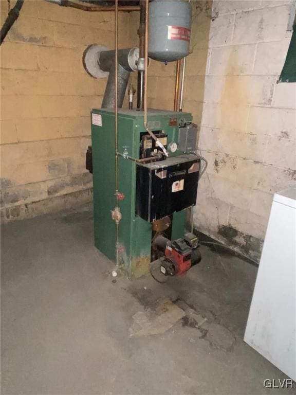 utility room featuring a heating unit