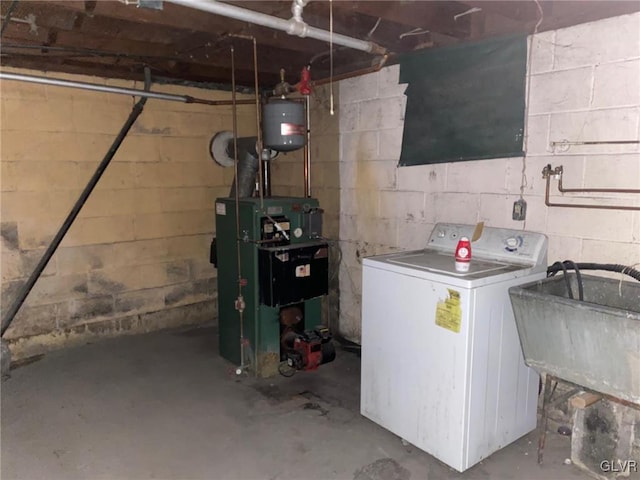 interior space featuring washer / dryer, a heating unit, and a sink